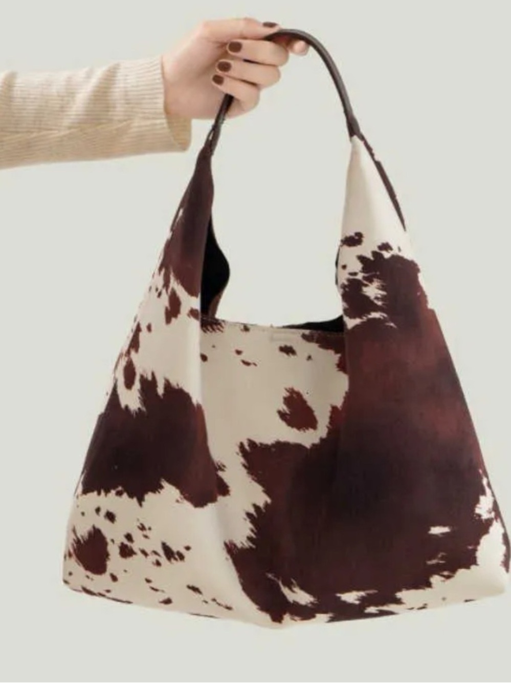 Cow Print Suede
Shoulder Bag slouchy hobo silhouette